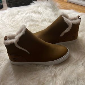 Fuzzy faux fur lined timberland pull-on fashion sneakers. Like new, worn once